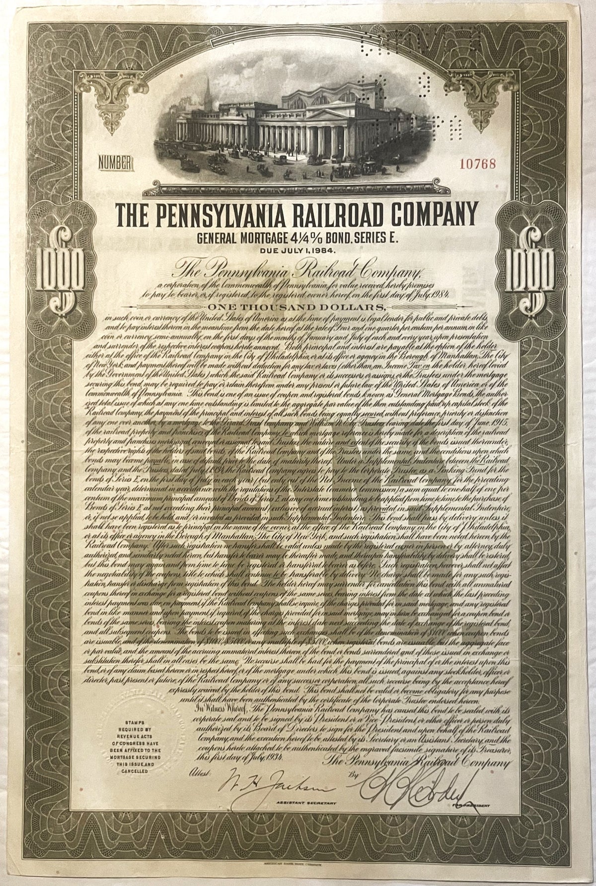 Vintage 1934 Pennsylvania Railroad $1000 bond certificate with Penn Station engraving, ornate border, and signatures