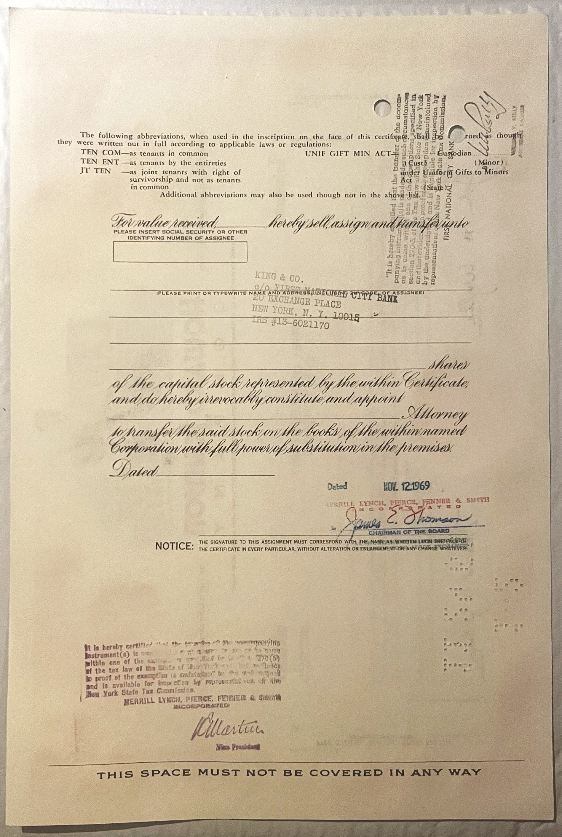 Cream-colored Howard Johnson stock certificate for 100 shares with printed text, signatures, and company letterhead on a