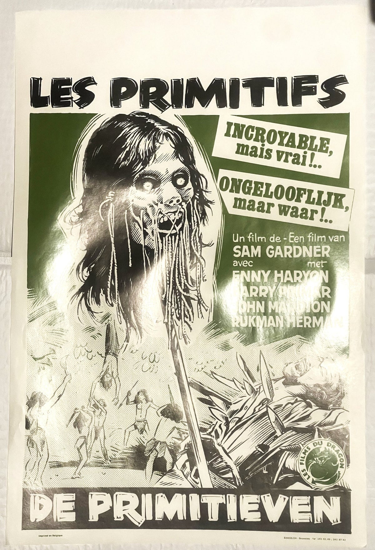 Vintage Belgian movie poster featuring grotesque face with dripping features, green and black ink on cream paper, Dutch/Frenc