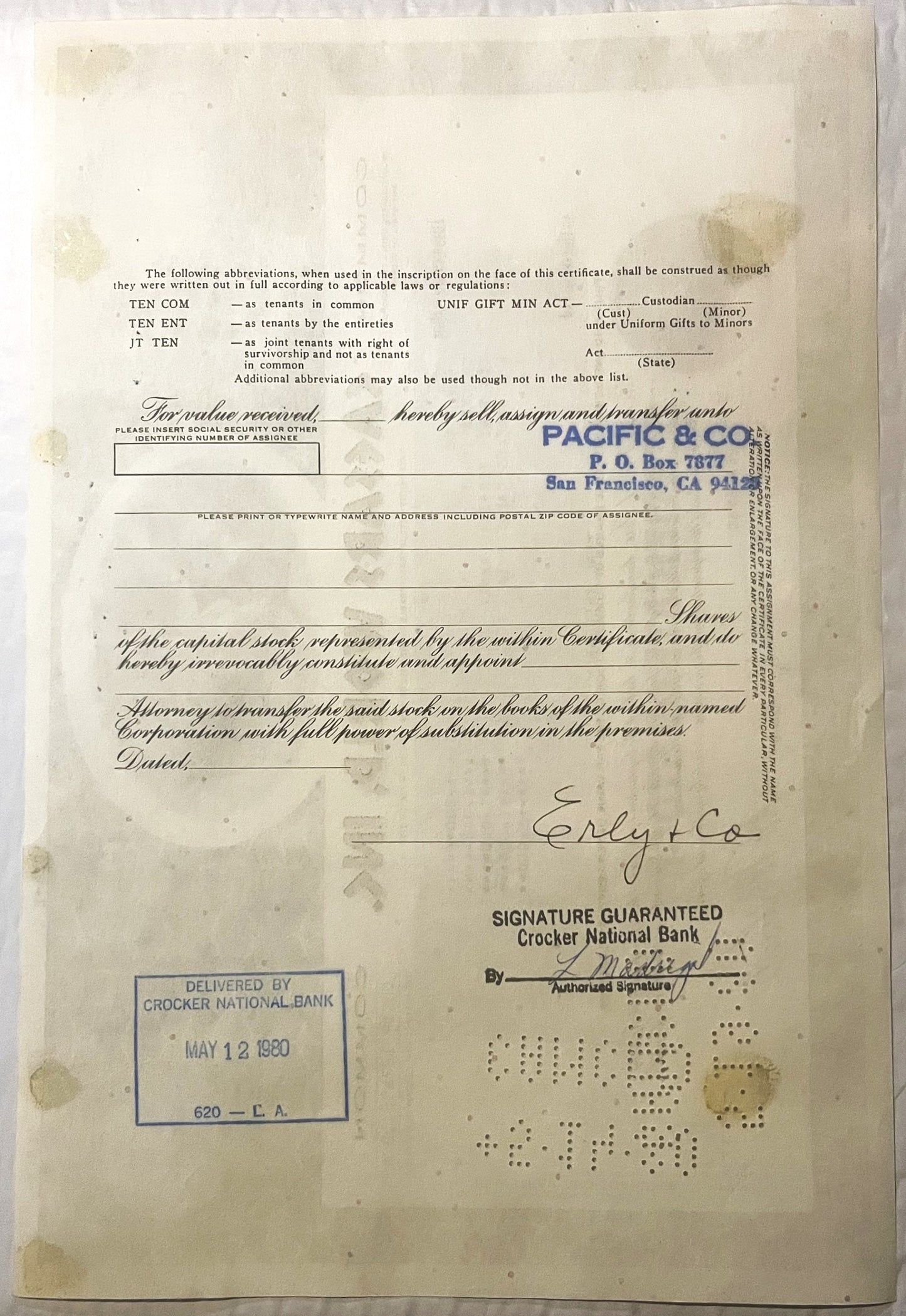 Aged stock certificate from with cream paper, handwritten signatures, Crocker National Bank stamp, and Pacific & Co. add