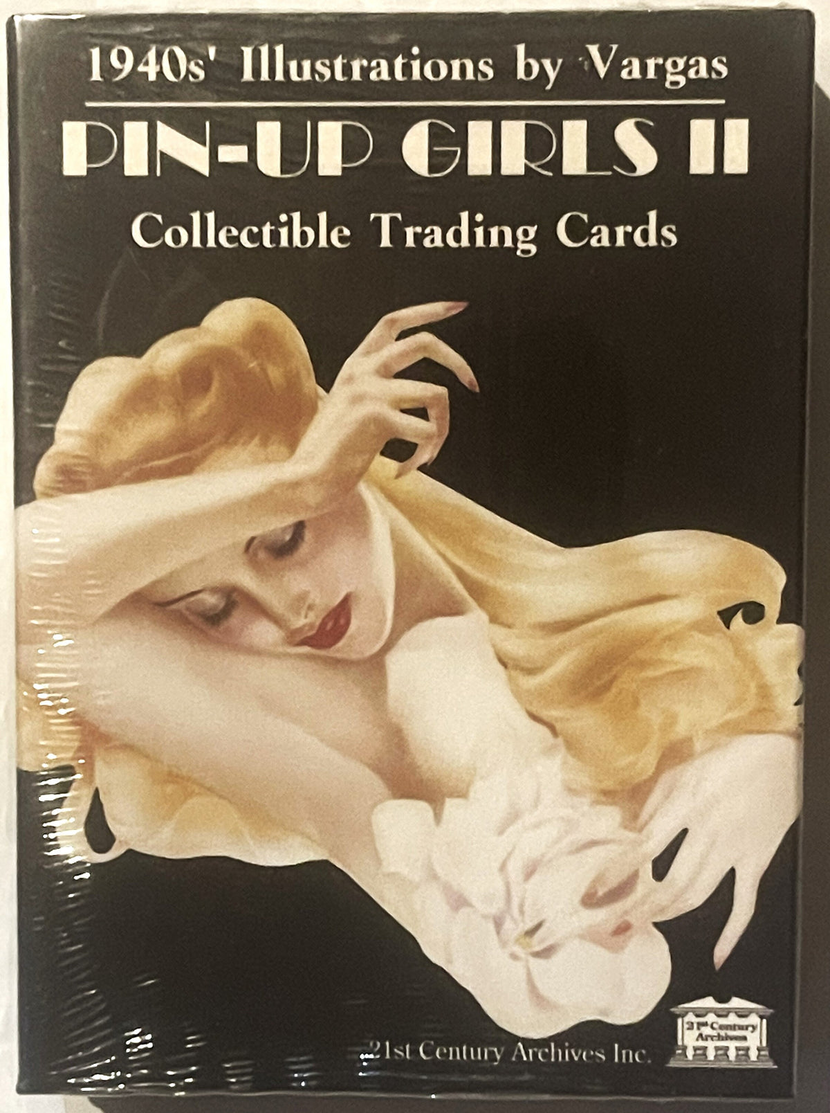 Sealed box of 1940s Pin-Up Girls II trading cards by Vargas, featuring illustration of blonde woman in flowing white garment 