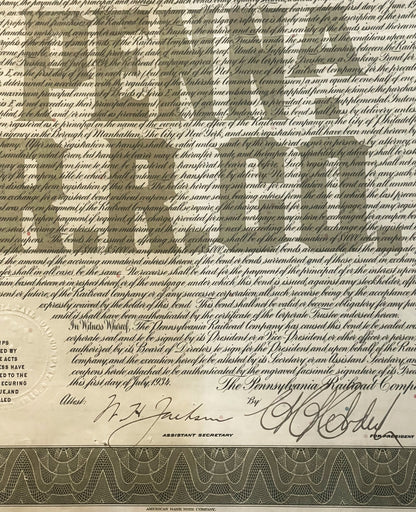 Vintage 1934 Pennsylvania Railroad $1000 gold bond document with ornate borders, signatures, and decorative coupon sheet at b