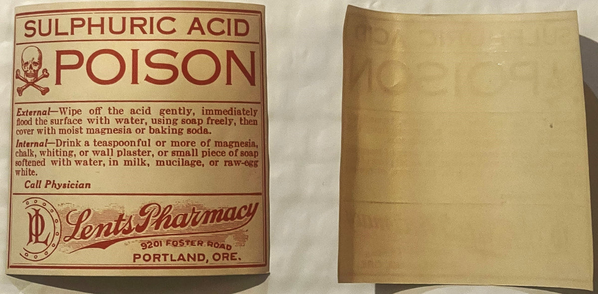 Vintage sulphuric acid poison label from Lents Pharmacy Portland Oregon, showing skull and crossbones symbol, red text on cre