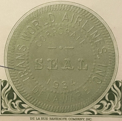 Close-up of circular bond certificate seal with embossed text and decorative corner flourishes, printed by De La Rue Banknote