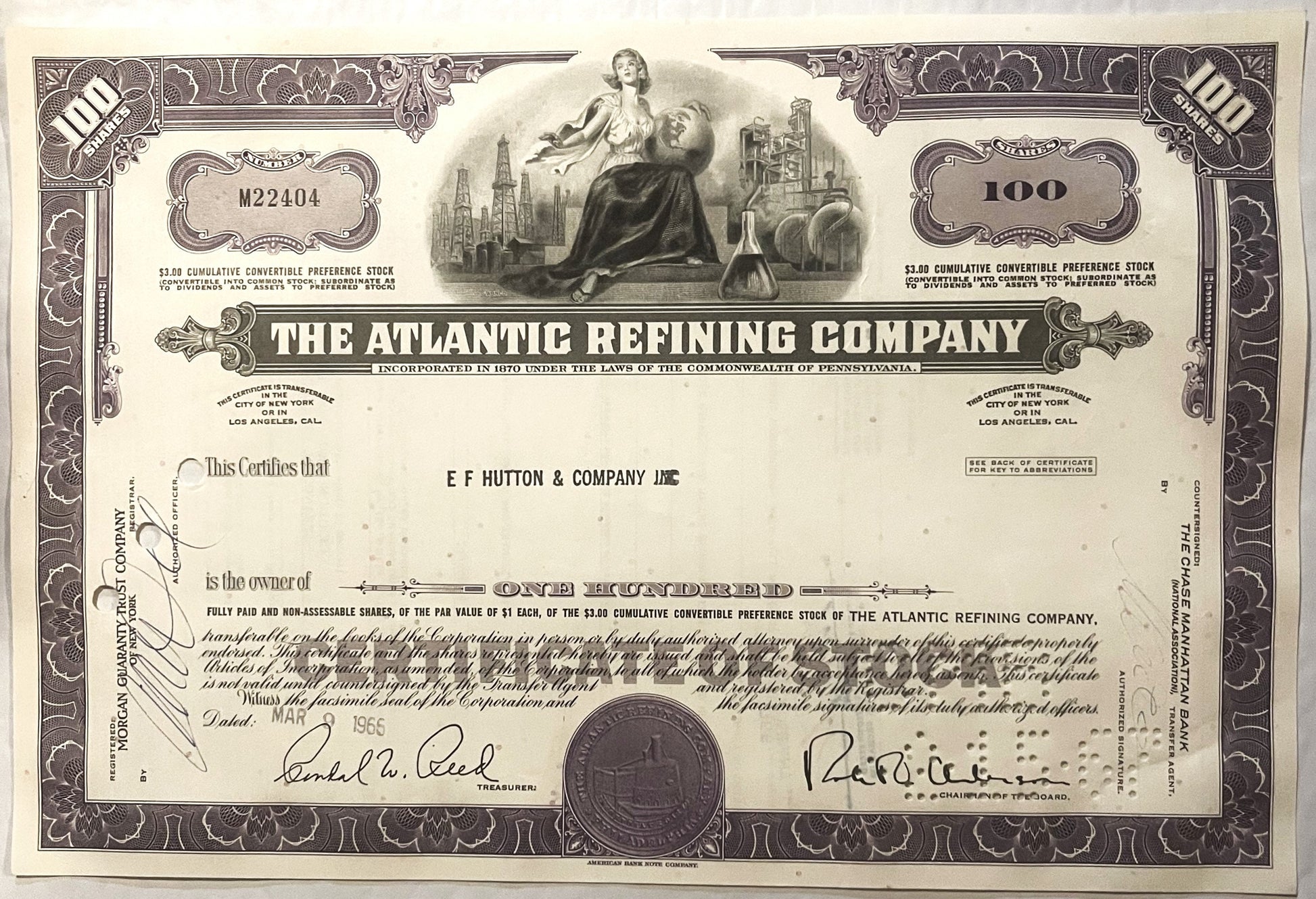 Vintage stock certificate from Atlantic Refining Company, featuring ornate borders, allegorical figures, and signa
