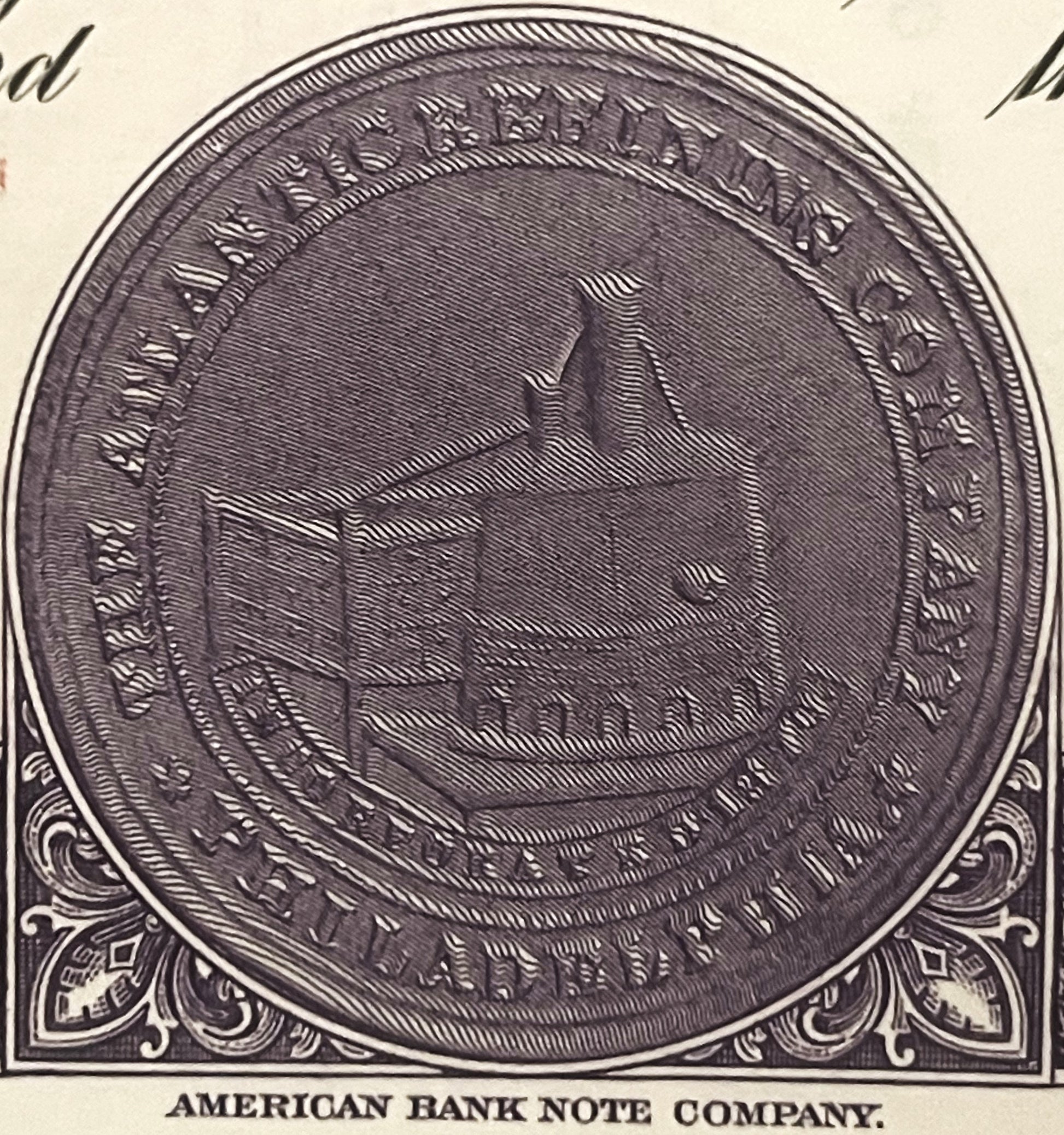 Black and white engraved circular seal from American Bank Note Company showing detailed line work and ornamental corners on c