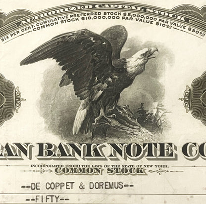 Antique bank stock certificate featuring engraved bald eagle vignette with spread wings perched on rocky outcrop, surrounded 