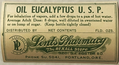 Vintage eucalyptus oil label from Lends Pharmacy in Portland, Oregon, printed in green and black on cream paper with usage in