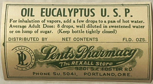 Vintage eucalyptus oil label from Lends Pharmacy in Portland, Oregon, printed in green and black on cream paper with usage in