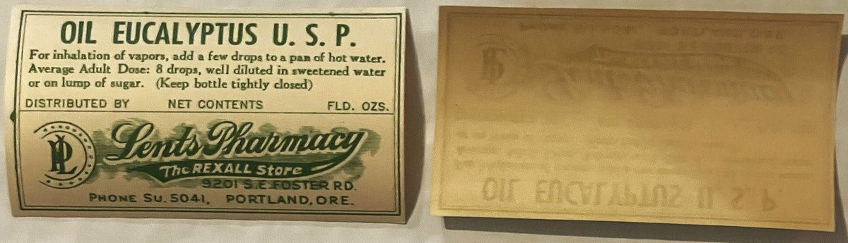 Vintage eucalyptus oil bottle label from Lents Pharmacy in Portland, Oregon, showing dosage instructions and net contents, di