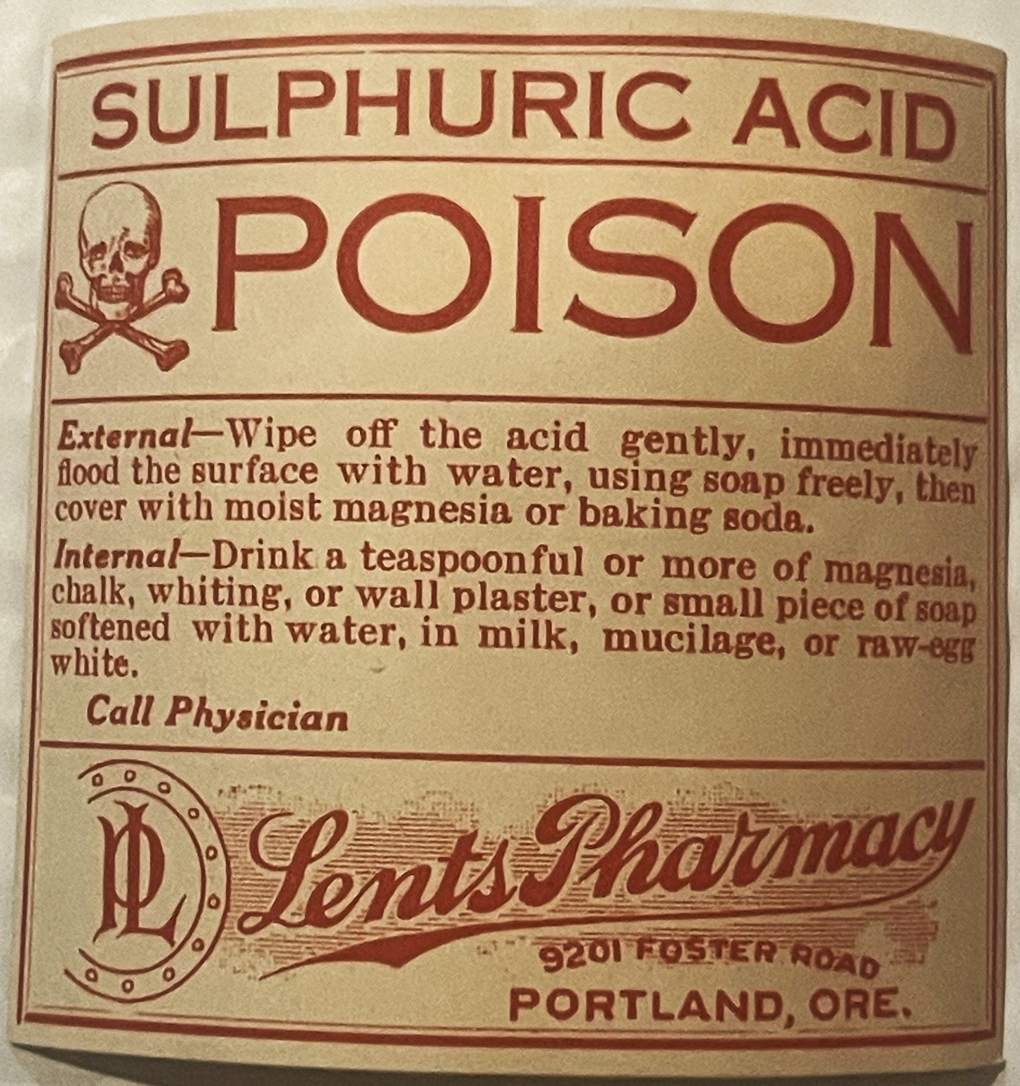 Antique poison label for sulphuric acid from Lents Pharmacy Portland Oregon, featuring skull and crossbones symbol and treatm
