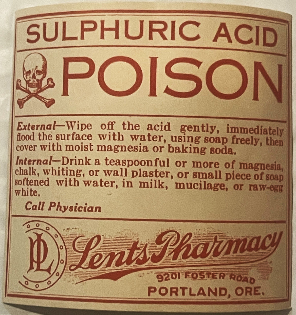 Antique poison label for sulphuric acid from Lents Pharmacy Portland Oregon, featuring skull and crossbones symbol and treatm