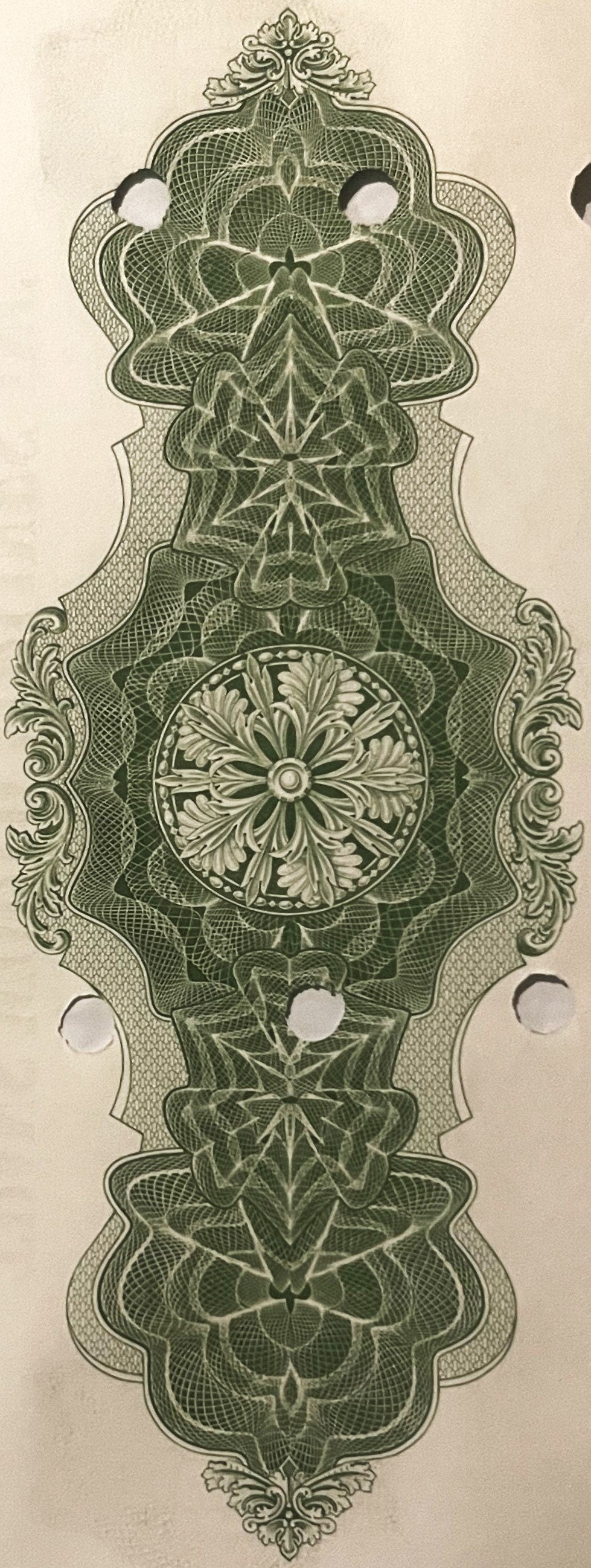 Ornate engraved vignette from vintage bond certificate featuring symmetrical geometric and floral patterns in green ink on cr