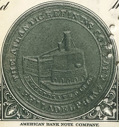 Engraved circular vignette from American Bank Note Company showing an industrial oil refinery with storage tanks and smokesta