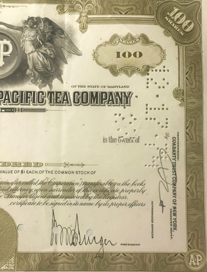 Vintage stock certificate for Pacific Tea Company of Maryland, 100 shares, cream-colored with ornate border and angel illustr