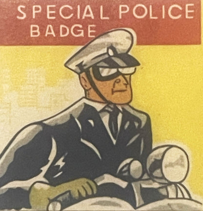 Vintage tin litho card with illustration of uniformed police officer on motorcycle, "SPECIAL POLICE BADGE" text at top, yello
