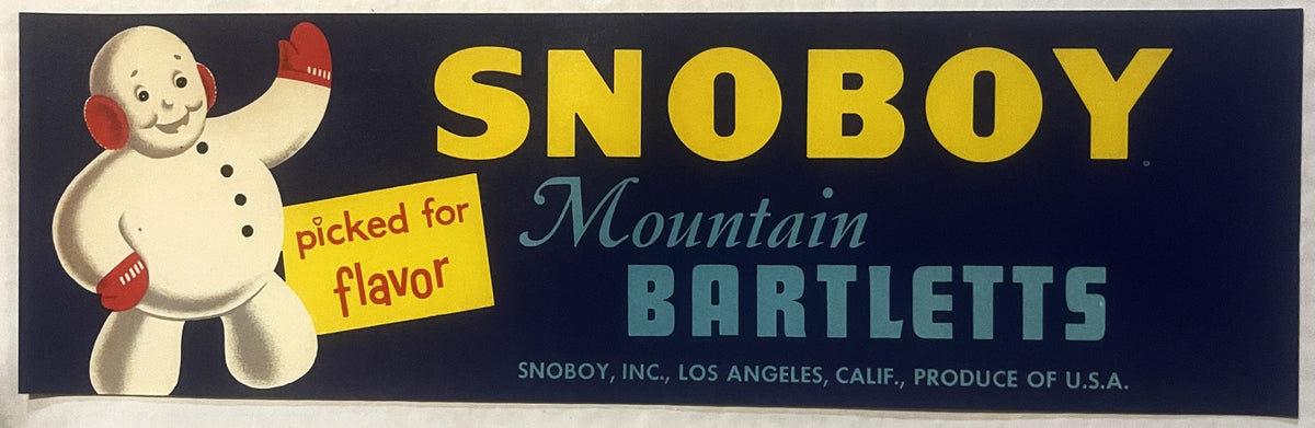 Vintage Snoboy fruit crate label featuring a smiling snowman with red mittens and text reading "Mountain Bartletts" on dark b
