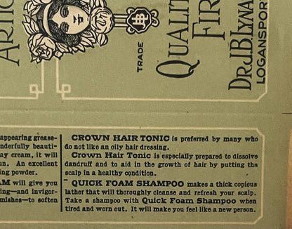 Close-up of vintage JBL Toilet Articles box showing printed text about Crown Hair Tonic and Quick Foam Shampoo on tan cardboa