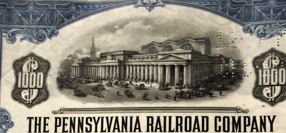 Vintage Pennsylvania Railroad bond certificate featuring classical building with columns and ornamental borders in sepia tone