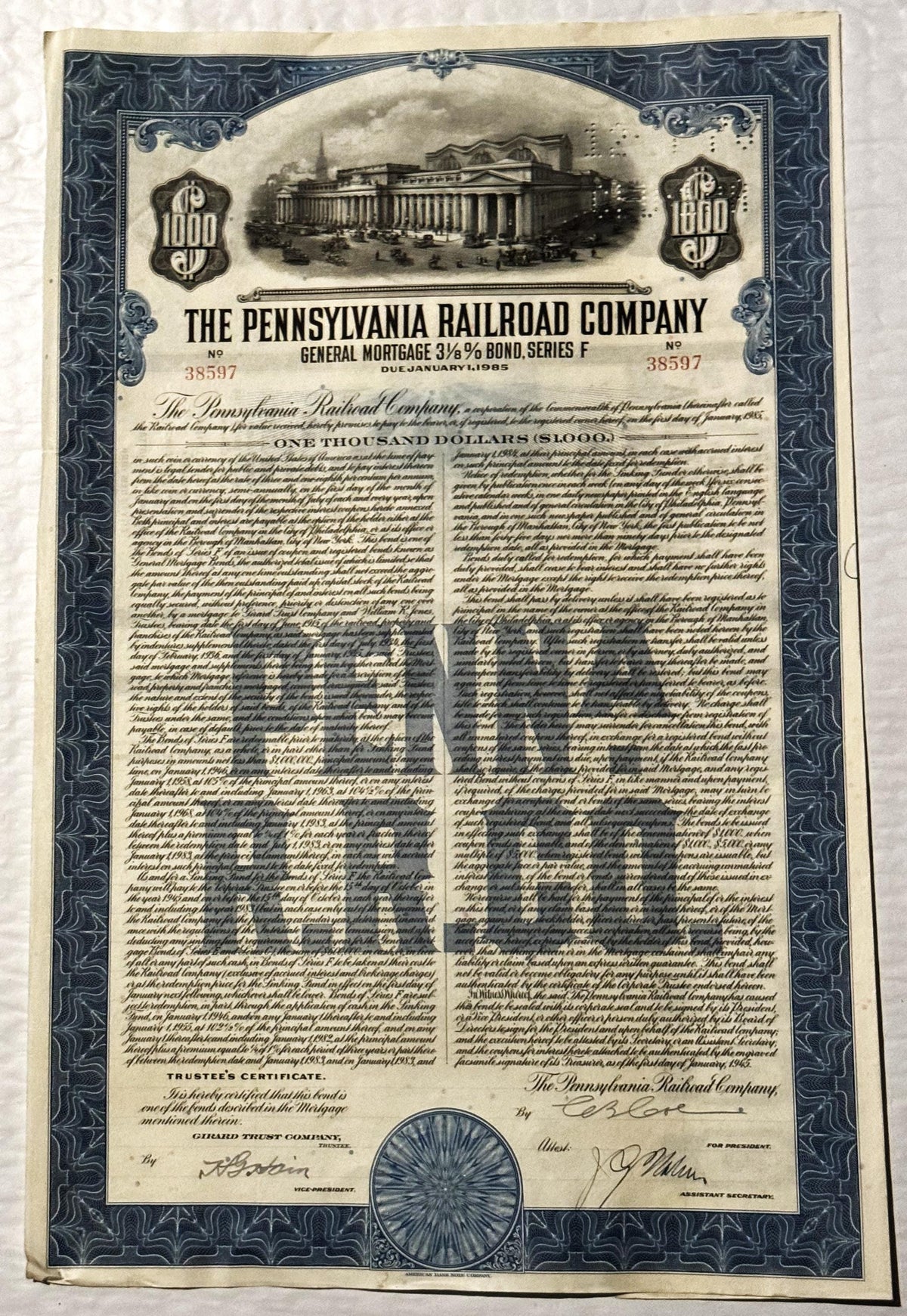 Vintage 1945 Pennsylvania Railroad General Mortgage Bond certificate with ornate border, Penn Station vignette, and signature