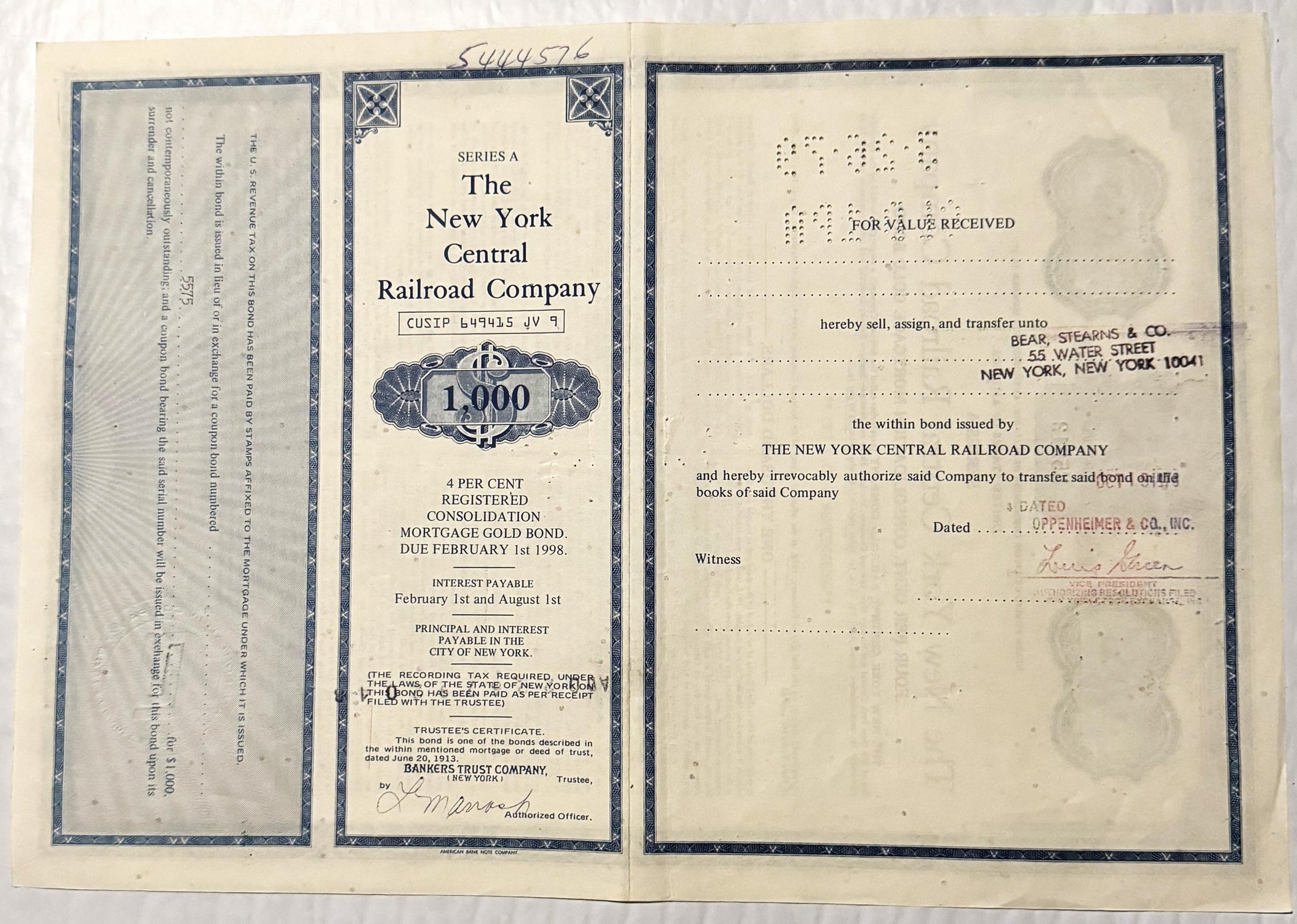 Three pages of a 1913 New York Central Railroad 1,000 gold bond certificate with ornamental borders, showing front cover, bon