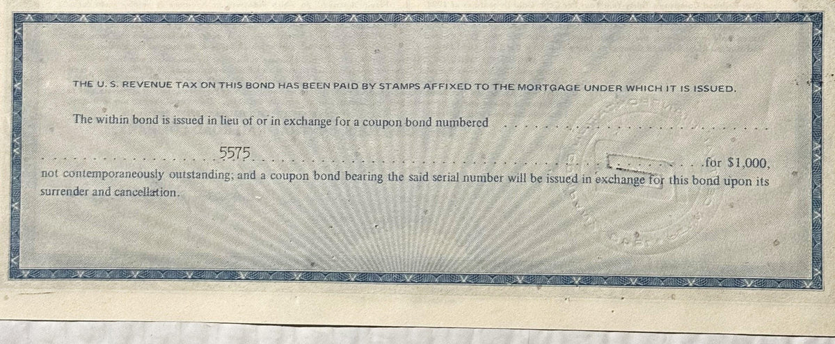 Close-up of text section from 1913 New York Central Railroad bond certificate detailing coupon bondfor $1,000 wi
