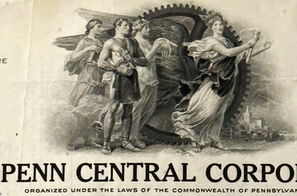 Vintage engraving of five classical figures in robes with large gear wheel, labeled "PENN CENTRAL CORPO" at bottom on aged pa