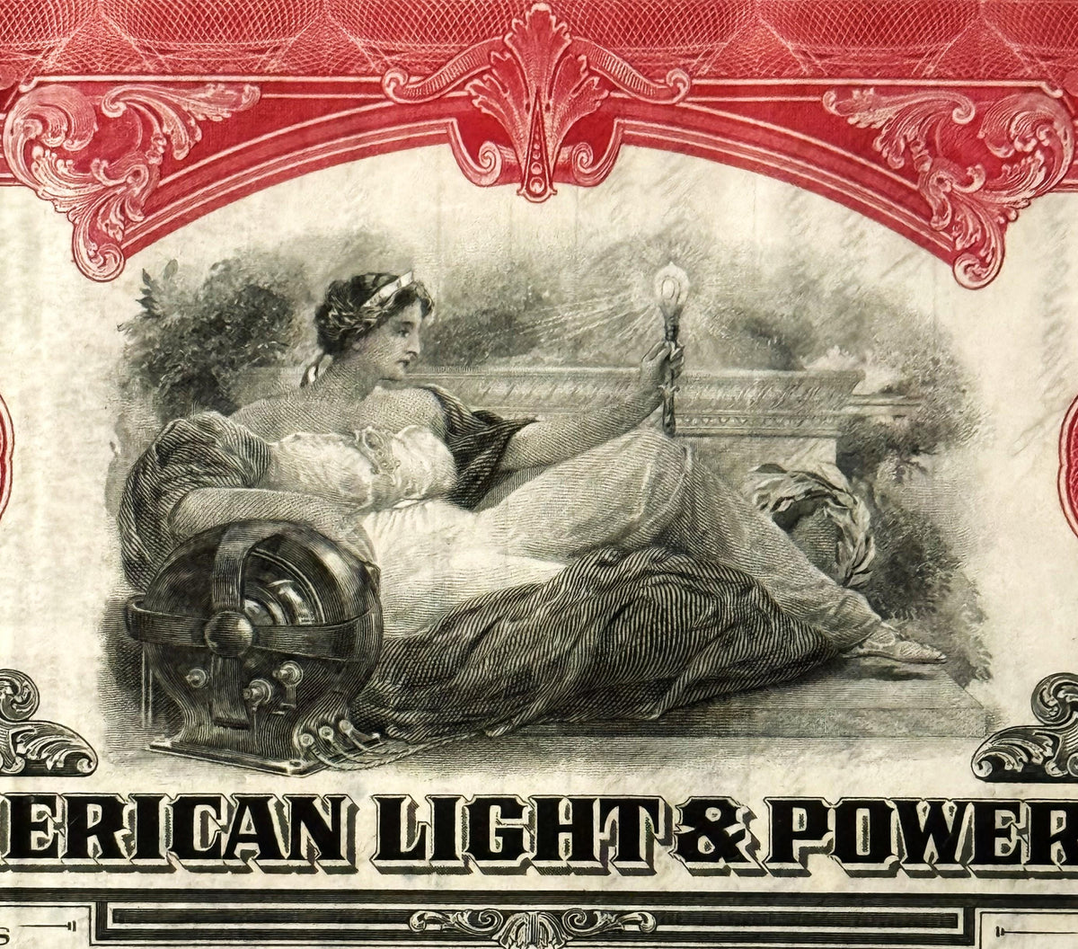 Ornate red-bordered stock certificate featuring engraved woman in classical dress reclining with mechanical gears, text reads