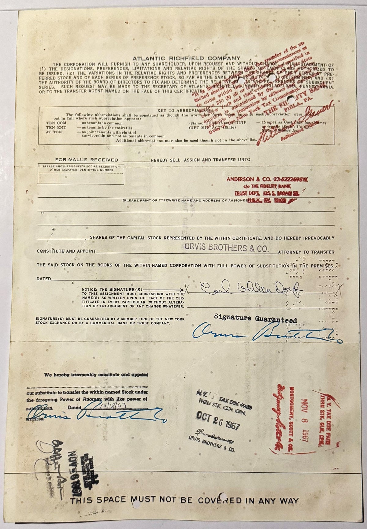 Vintage Atlantic Richfield Company stock certificate from with red stamps, signatures, and handwritten annotations on ag