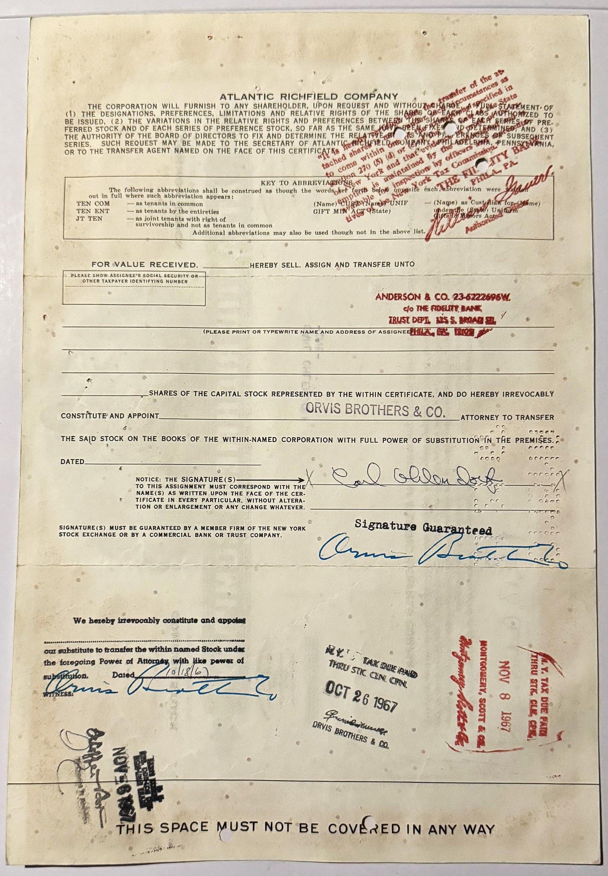 Vintage Atlantic Richfield Company stock certificate from with red stamps, signatures, and handwritten annotations on ag