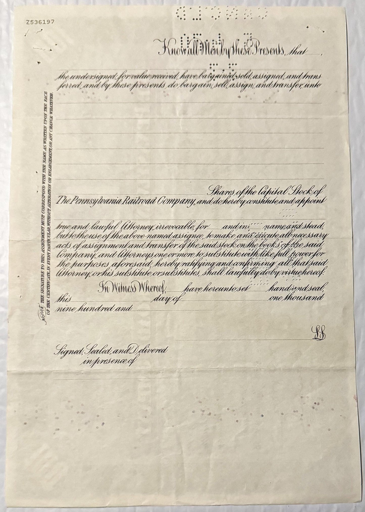 Cream-colored stock certificate form for Pennsylvania Railroad Company with ornate cursive headers and blank lines for detail