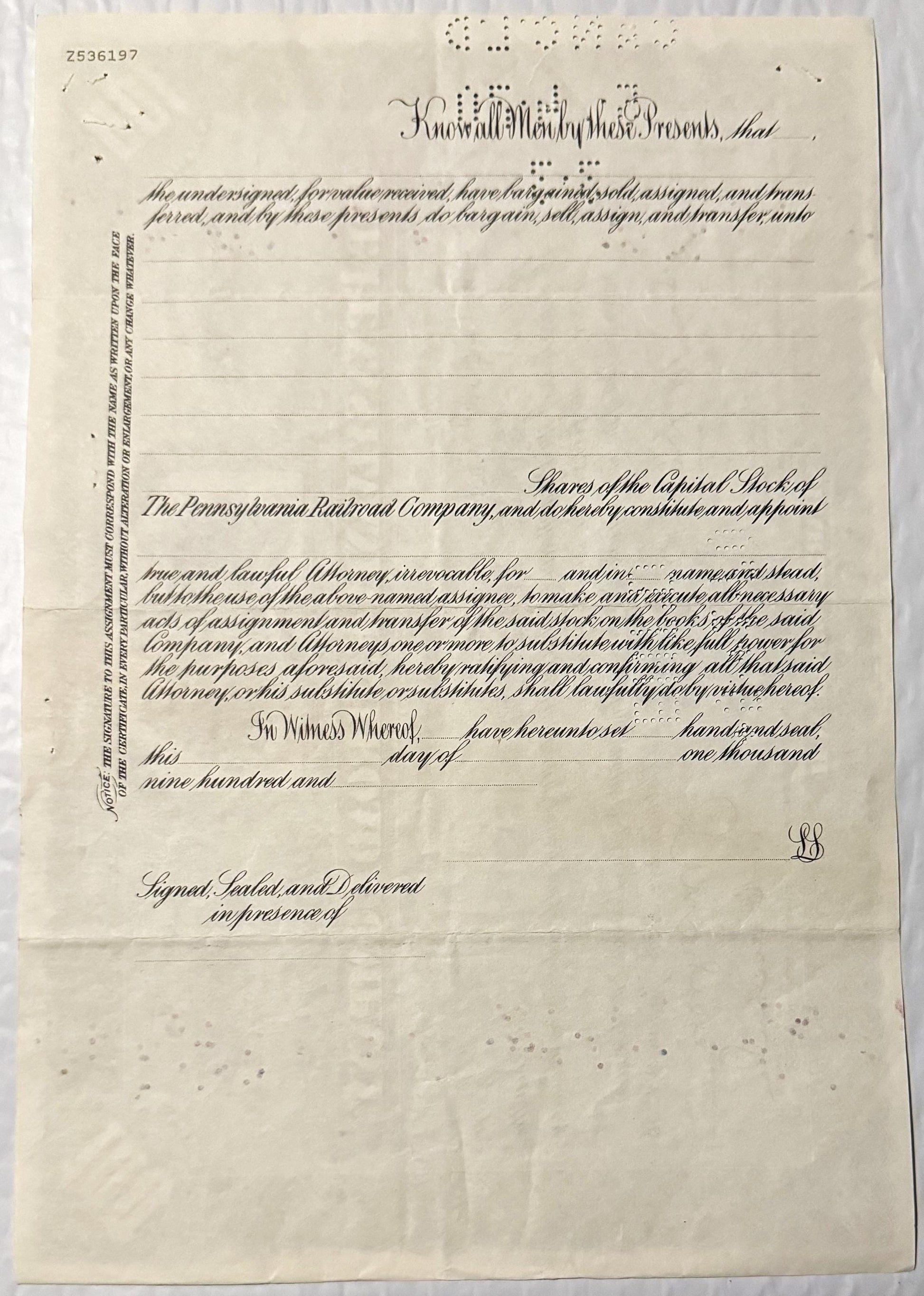 Cream-colored stock certificate form for Pennsylvania Railroad Company with ornate cursive headers and blank lines for detail