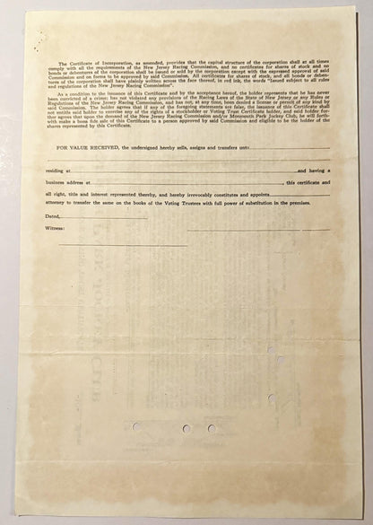 Aged cream-colored stock certificate page with printed legal text and blank signature lines, showing holes from binding or fi