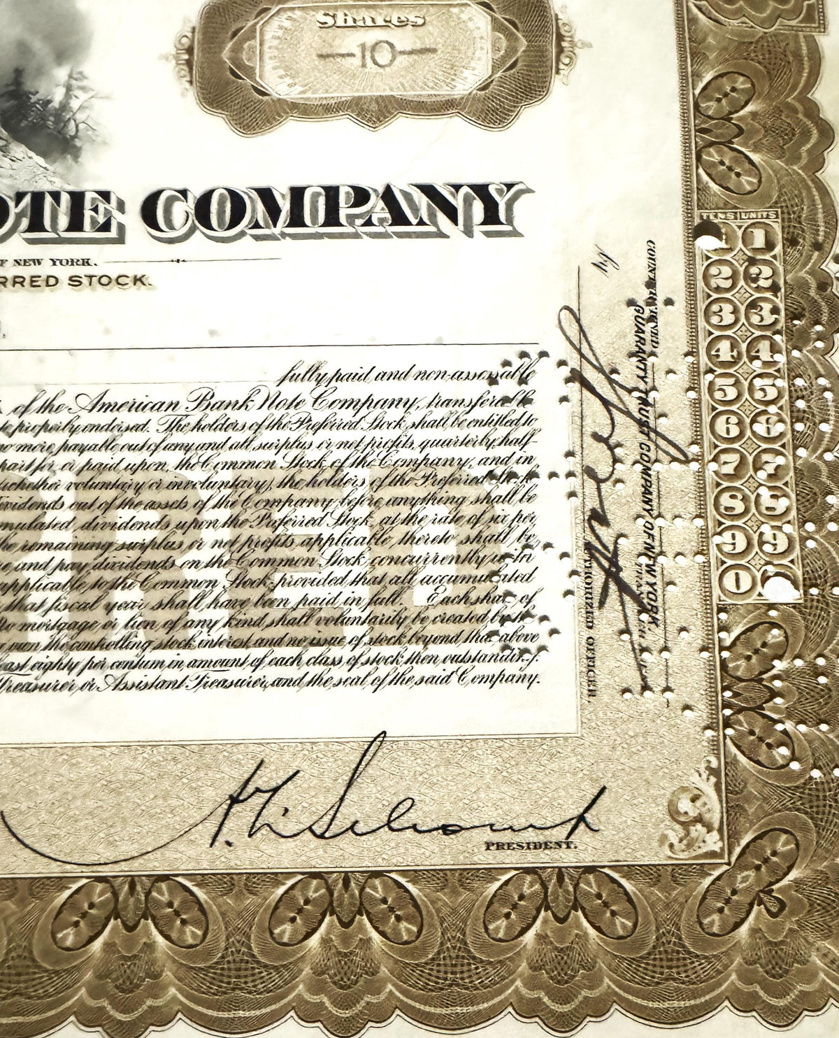 Antique stock certificate with ornate border, "10" denomination, brown eagle vignette, handwritten signature labeled "PRESIDE
