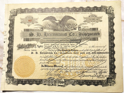 Sepia-toned S.H. Heironimus Co. stock certificate with eagle emblem, gold seal, ornate border, and handwritten signature