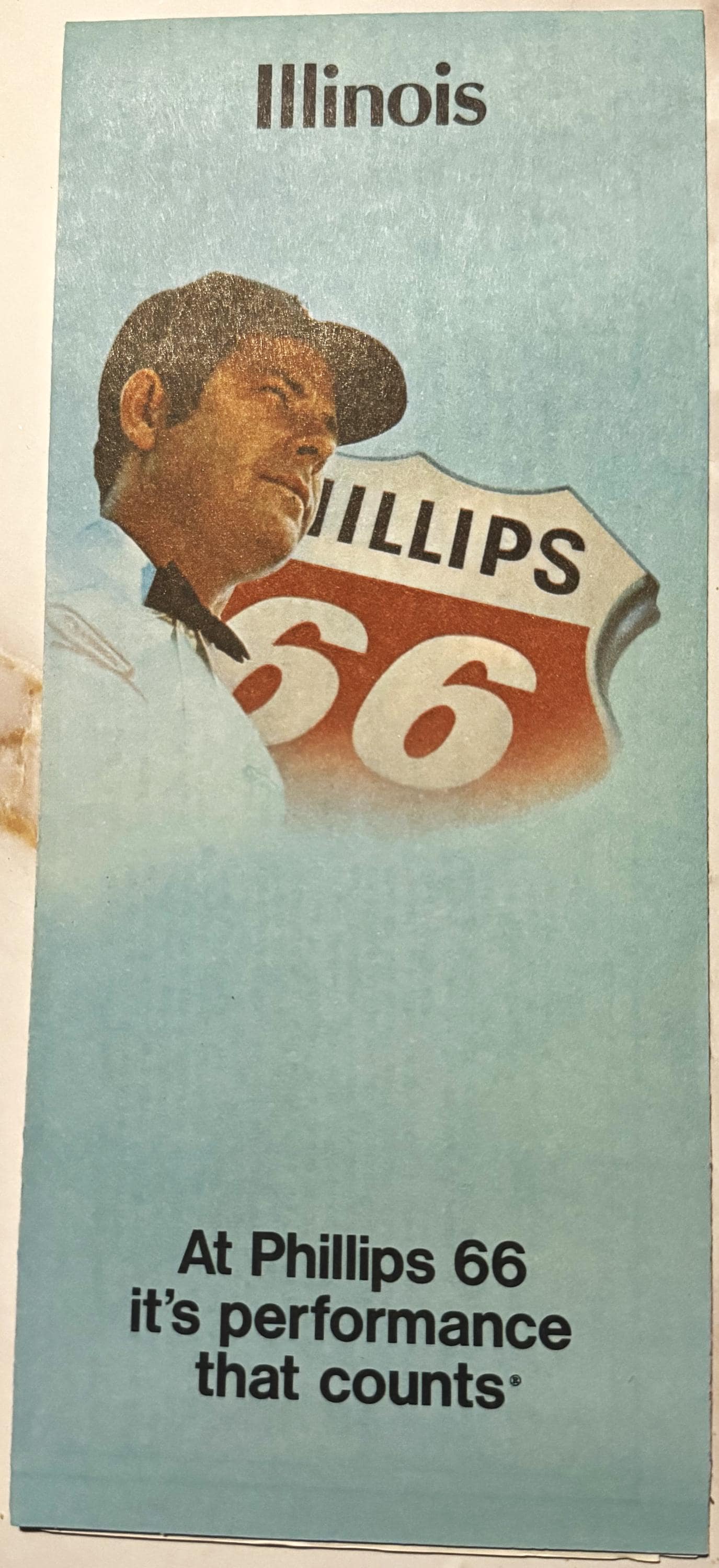 Vintage Phillips 66 Illinois Route 66 map brochure featuring illustrated man in cap wearing red jersey numbered 66 on light b