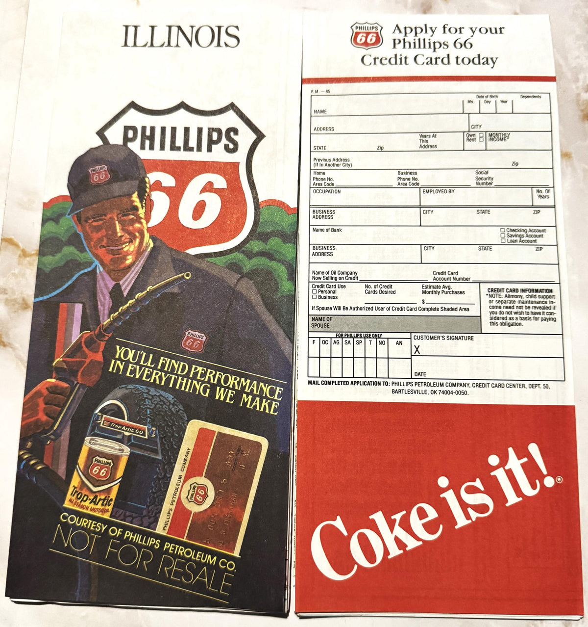 Vintage Phillips 66 Illinois map and Coca-Cola credit card application form displayed flat, showing Route 66 branding with ma
