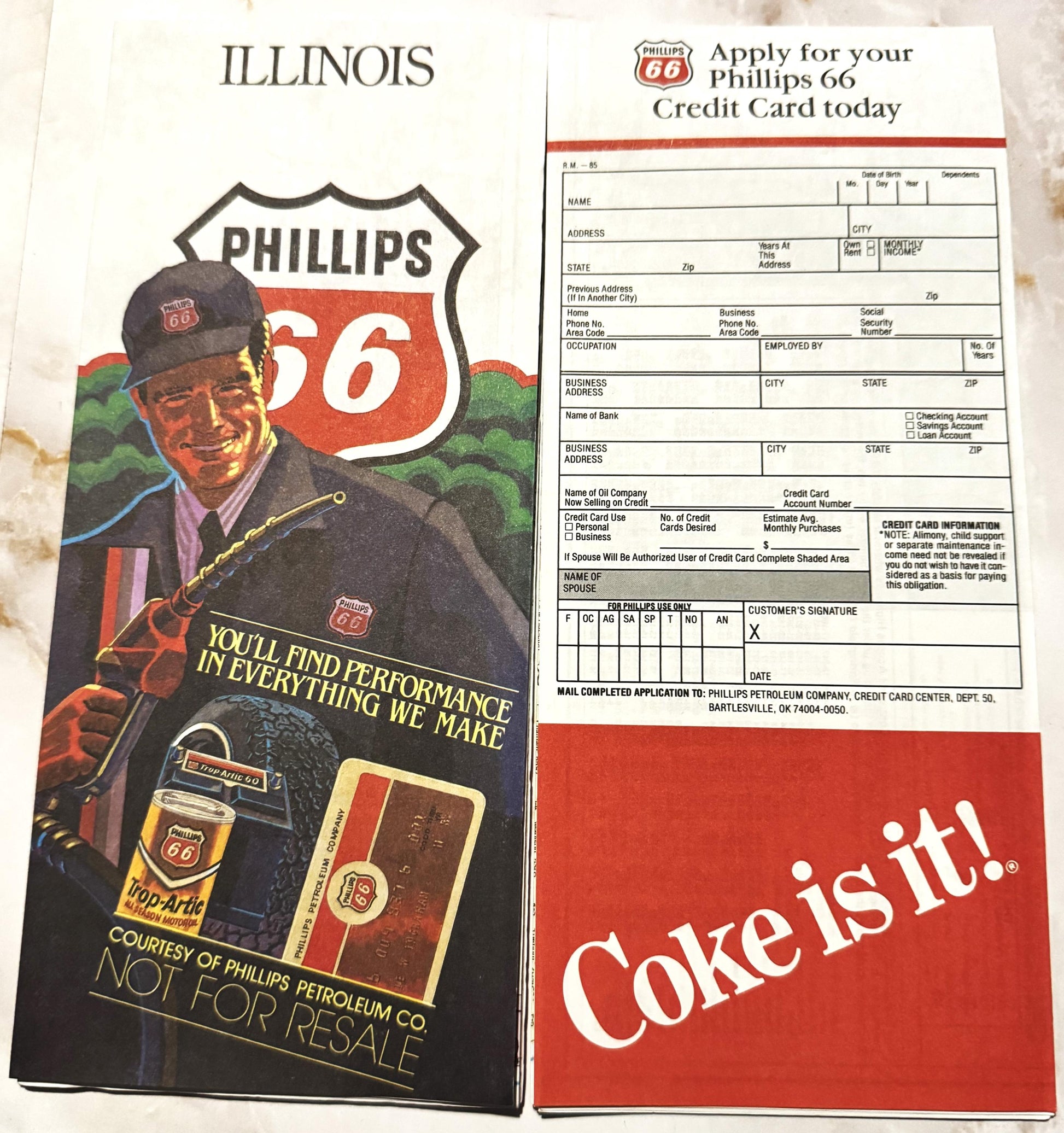 Vintage Phillips 66 Illinois map and Coca-Cola credit card application form displayed flat, showing Route 66 branding with ma
