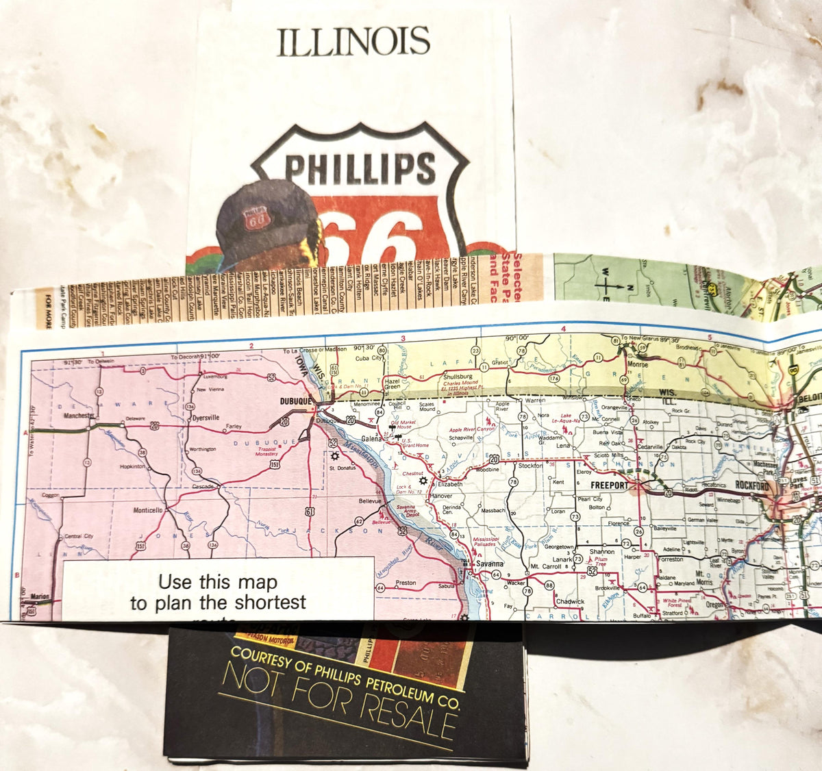 Vintage Phillips 66 Route 66 Illinois road map with Phillips 66 logo shield and Coca-Cola branding, displayed flat on white s