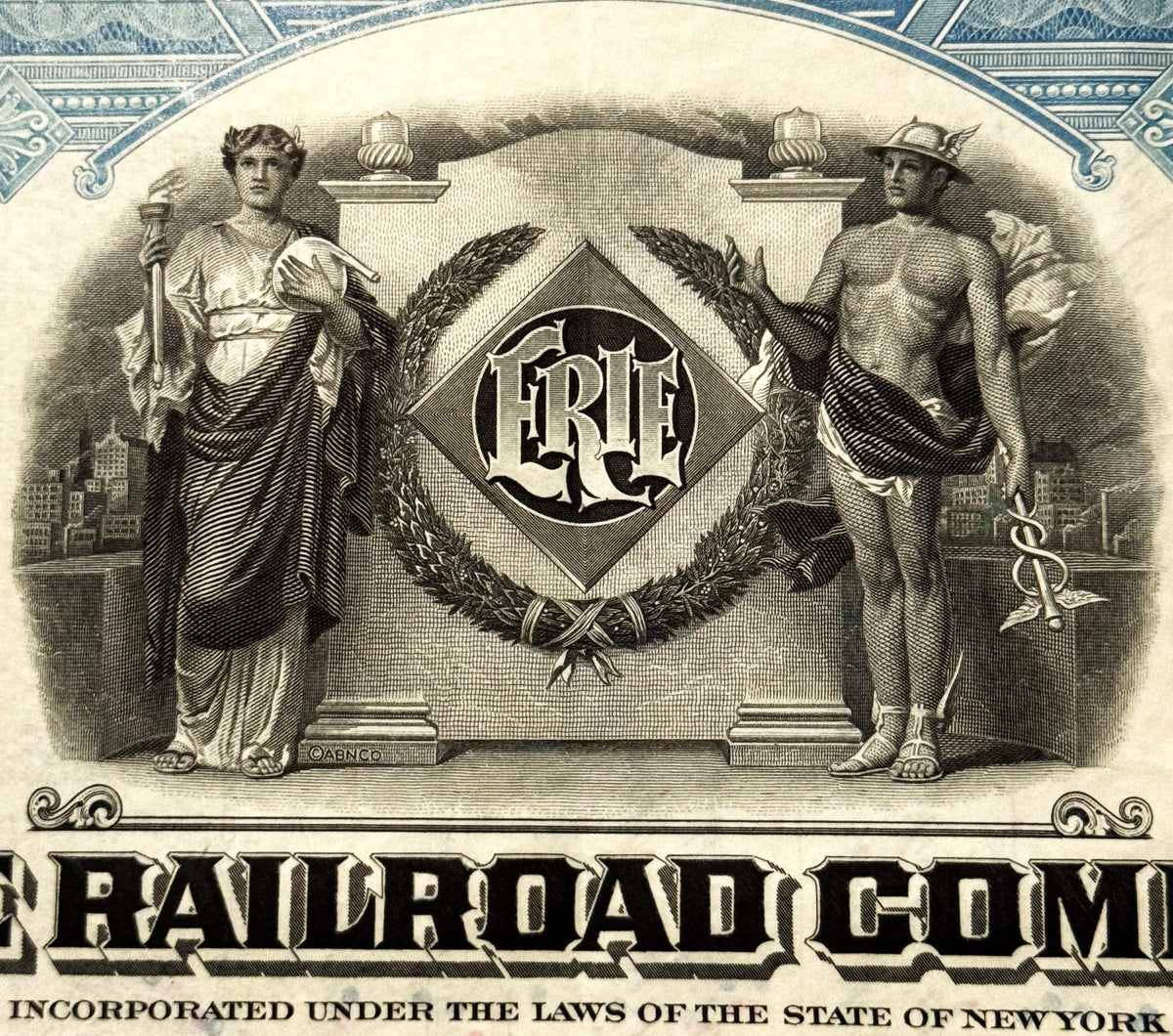 Ornate engraved Erie Railroad stock certificate featuring two classical figures flanking a diamond-shaped emblem with "ERIE" 