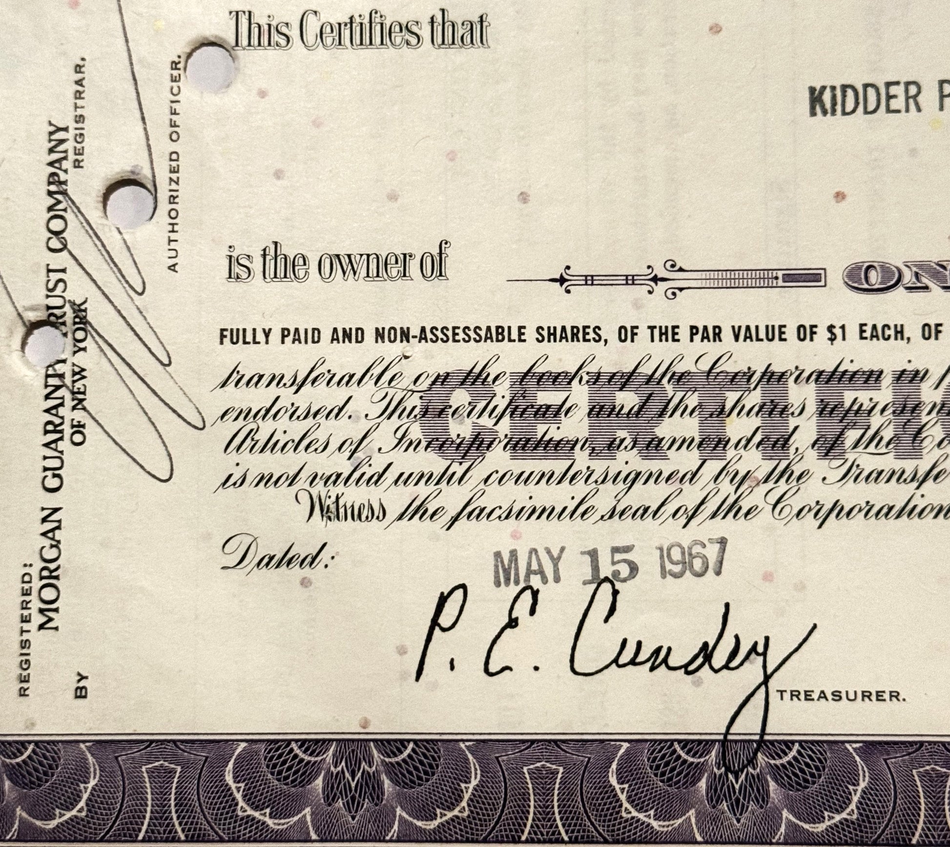 Vintage stock certificate from Atlantic Richfield Company, with ornate border and treasurer's signature vis