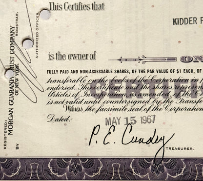 Vintage stock certificate from Atlantic Richfield Company, with ornate border and treasurer's signature vis