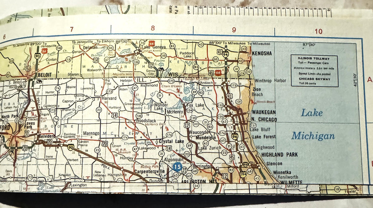 Vintage Illinois road map showing Route 66, towns, and Lake Michigan coastline, with ruler at top for scale