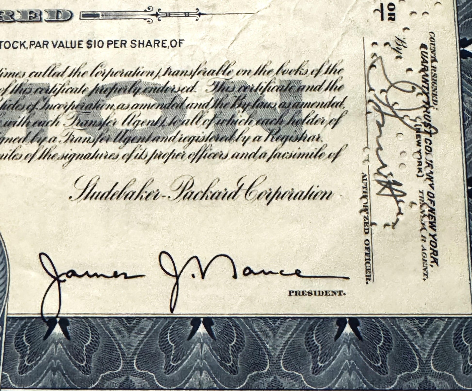 Studebaker-Packard Corporation stock certificate showing $10 par value shares, cream p