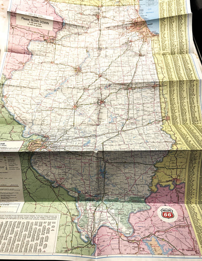 Vintage Phillips Route 66 map of Illinois and surrounding states with pink and green coloring, overlaid with other maps and i