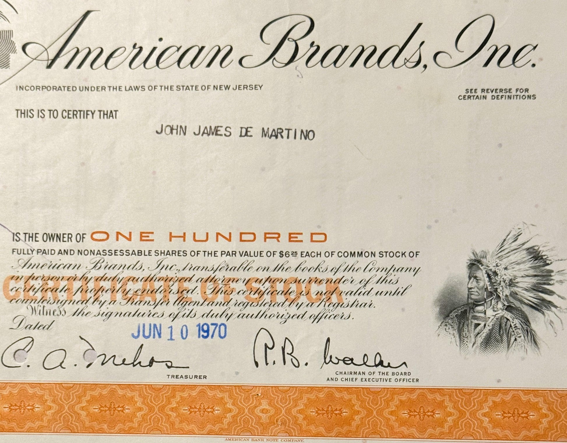 American Brands Inc stock certificate for 100 shares, featuring Native American chief vignette and signatures from treas