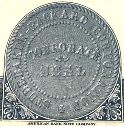 Close-up of ornate stock certificate reverse side with "AMERICAN BANK NOTE COMPANY" printed at bottom, decorative corner flou