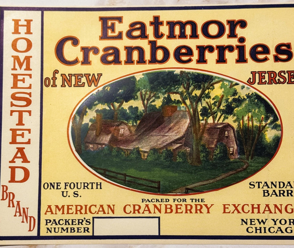 Vintage cranberry barrel label featuring a cottage farmhouse scene, orange and purple text on cream background, reading "Home