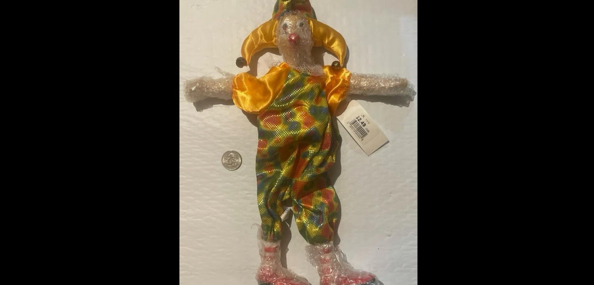 Plush toy duck in floral dress and pink shoes, perfect for rare doll collectors