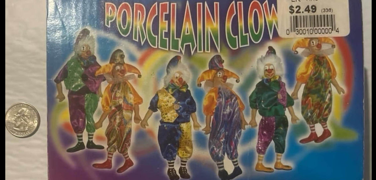 Three colorful jester figures in orange hats for a fun circus collector’s piece